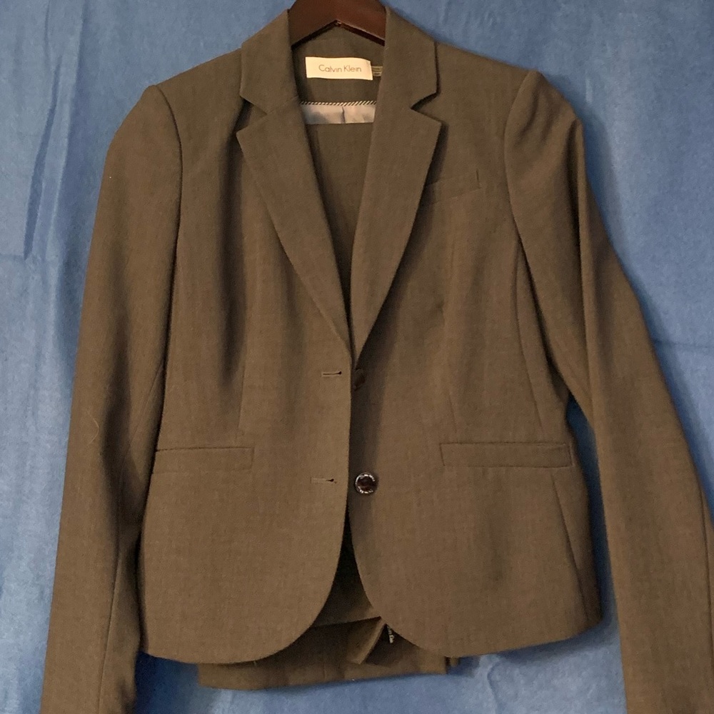 Two Calvin Klein pant suits